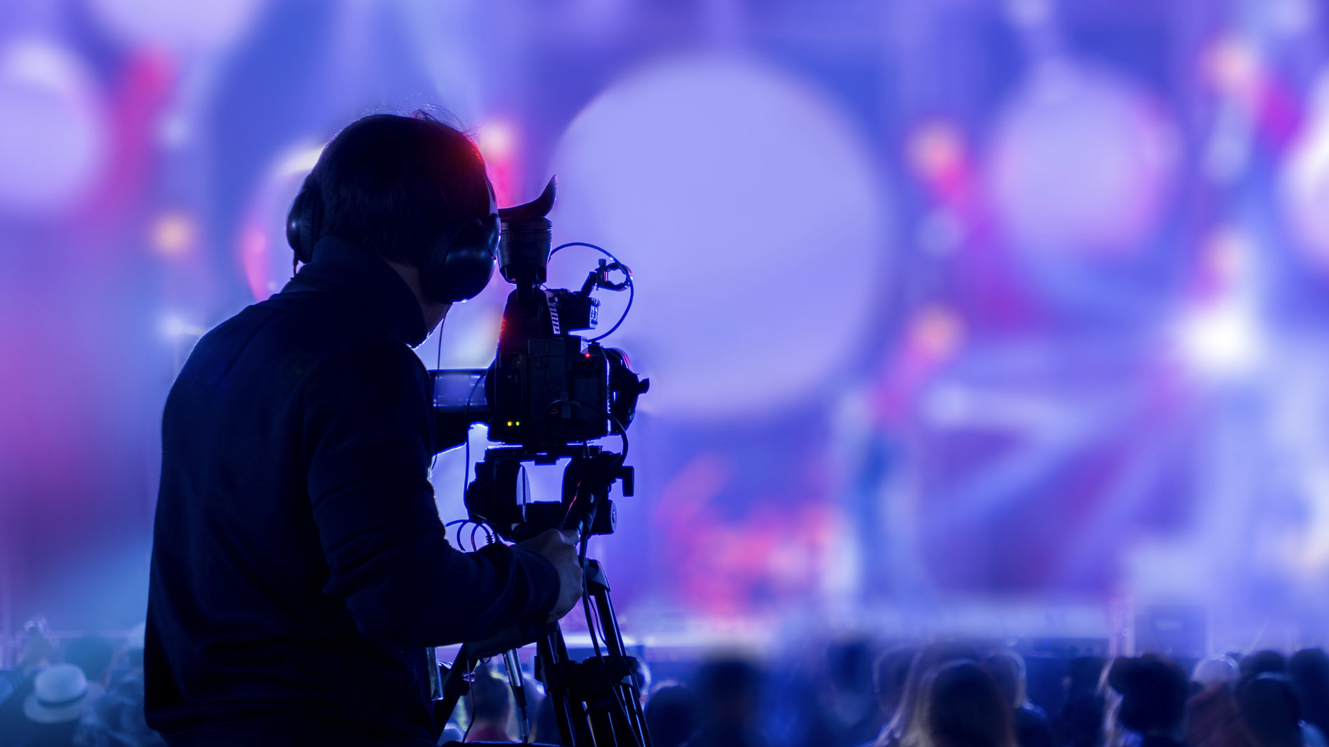 Camera person filming a church service