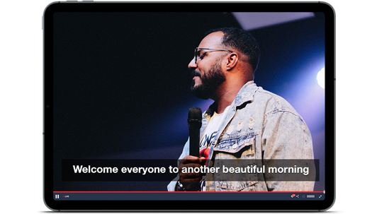 Tablet showing live stream with automated captioning