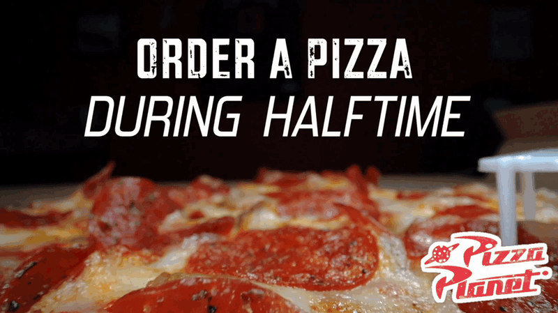 Sponsor advertisement saying enjoy a pizza during halftime