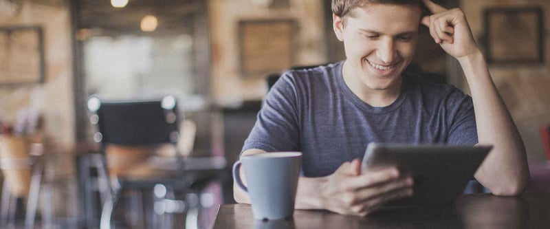 man watching video on tablet
