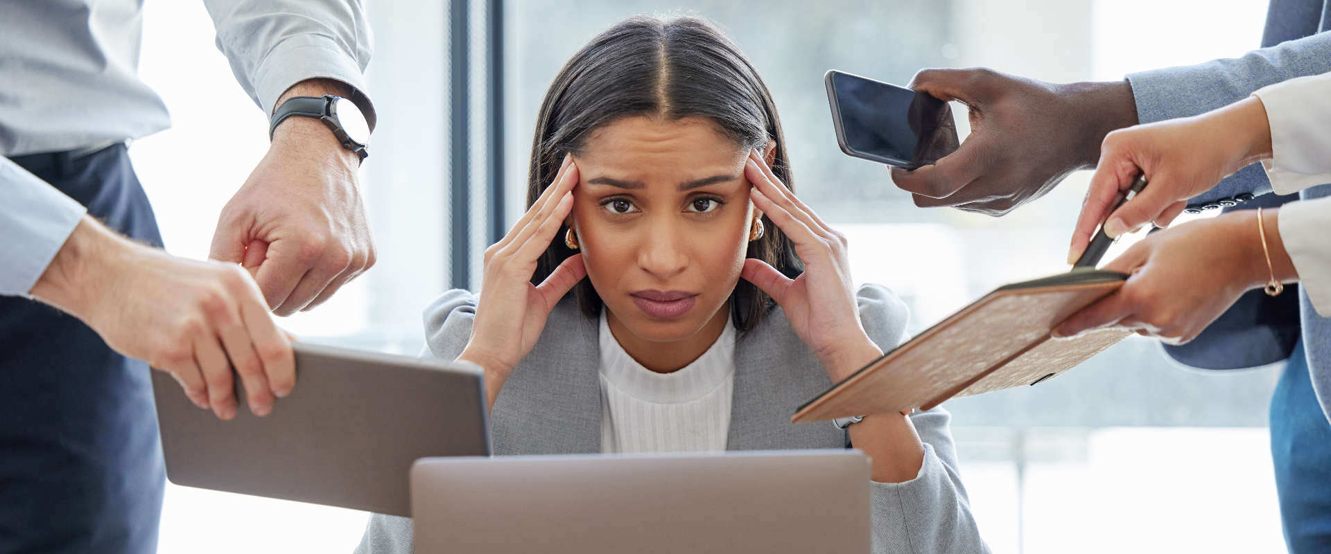 Woman overwhelmed by technology and AI