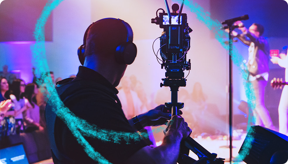 Cameraman filming a church worship service