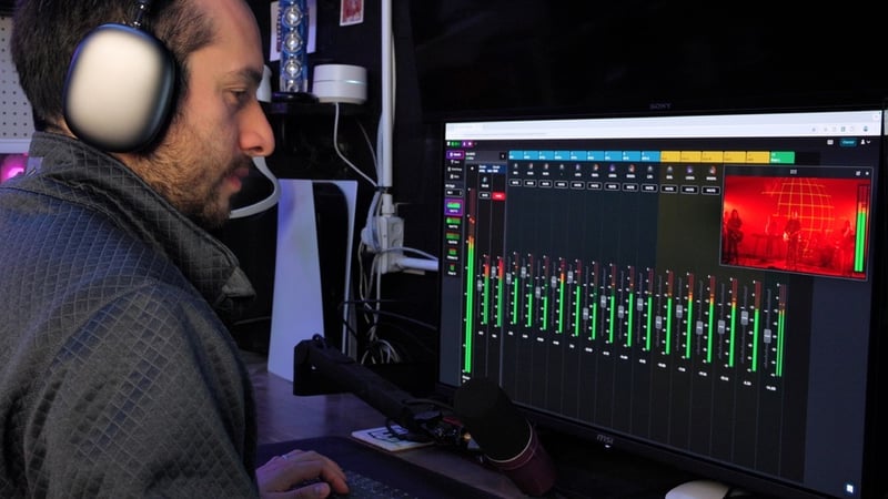 Person mixing audio remotely