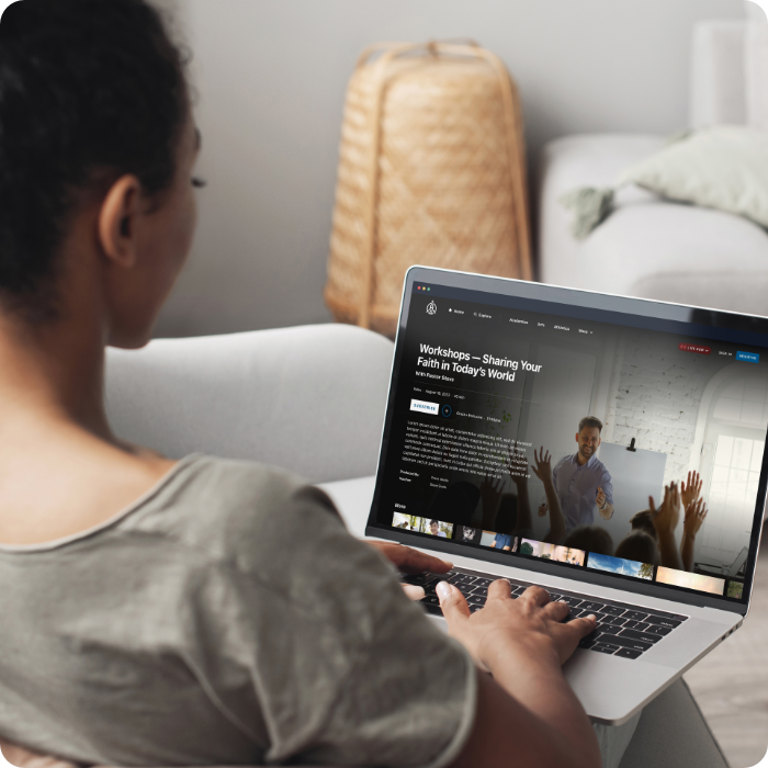 Woman watching a custom-branded OTT app on a laptop