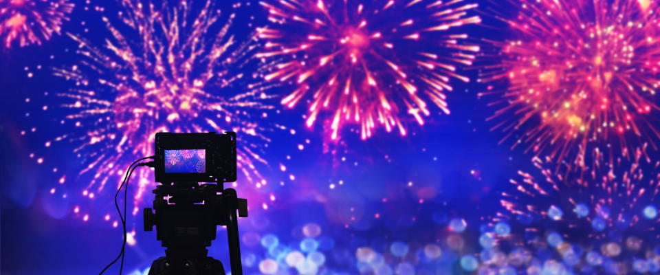 Video camera recording fireworks and holiday festivities