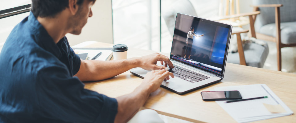 Man watching a live stream on his computer