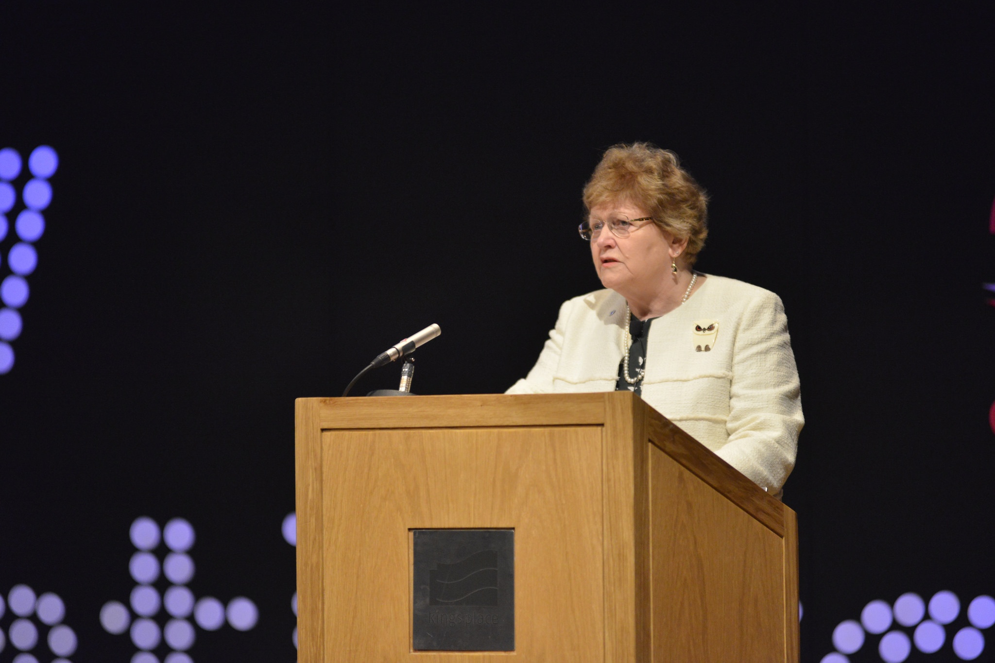 Woman speaking at church podium