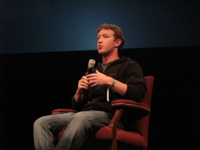 Facebook founder Mark Zuckerberg sits in chair